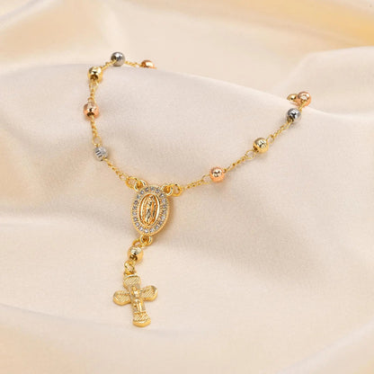 Pulsera con una Medalla de Nuestra Señora de Guadalupe Bañada en Oro