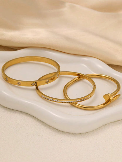 Juego de 3 Pulseras Romanas Chapadas En Oro